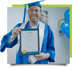 Andrew MacDonald beaming with pride at his Pitman Training Newcastle graduation ceremony, wearing traditional cap and gown